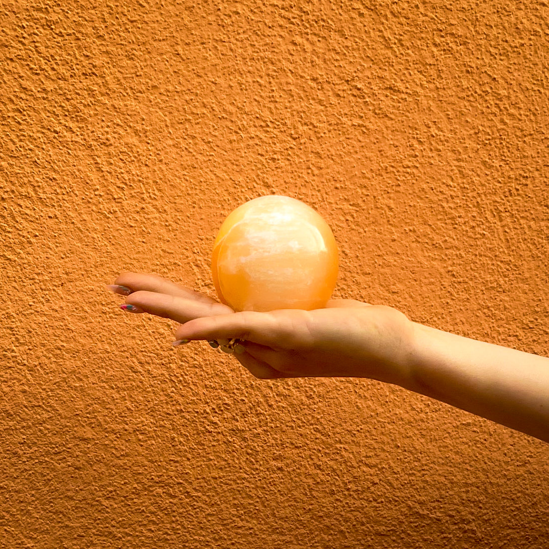 Esfera de selenita naranja (7cm)